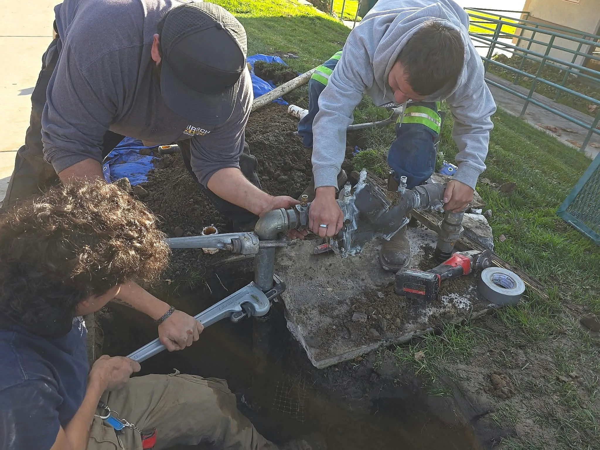 American Made Plumbing crew repairing a main water line