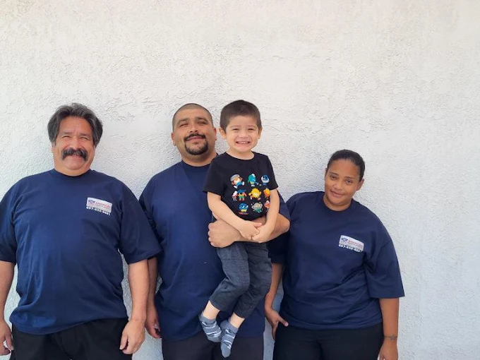 The American Made Plumbing family crew standing together in Rancho Cucamonga